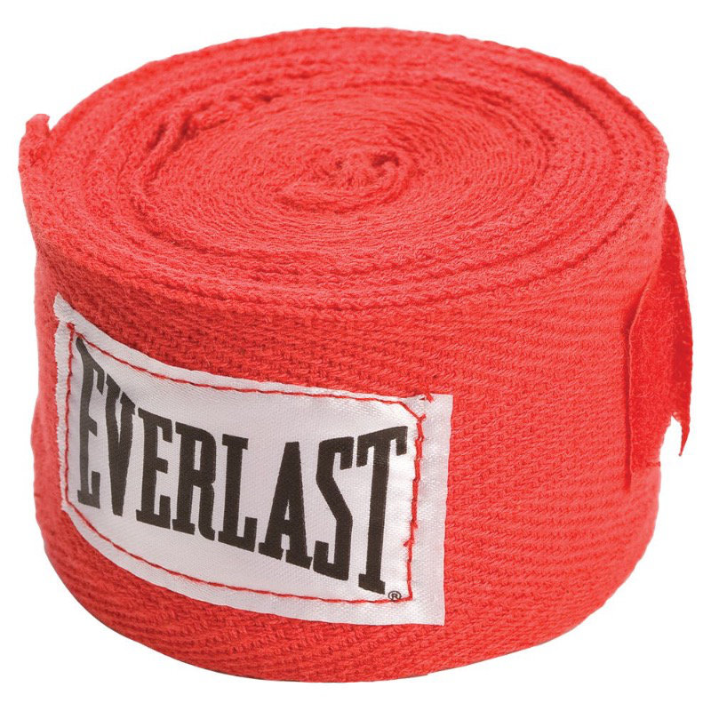 Dette er en sammenrullet handwrap fra Everlast. Handwrap er rød med everlast logo på siden.